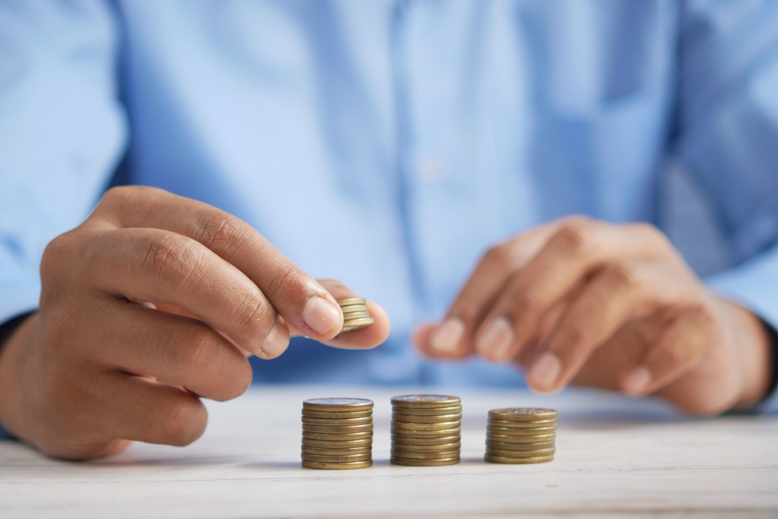 Person counting coins