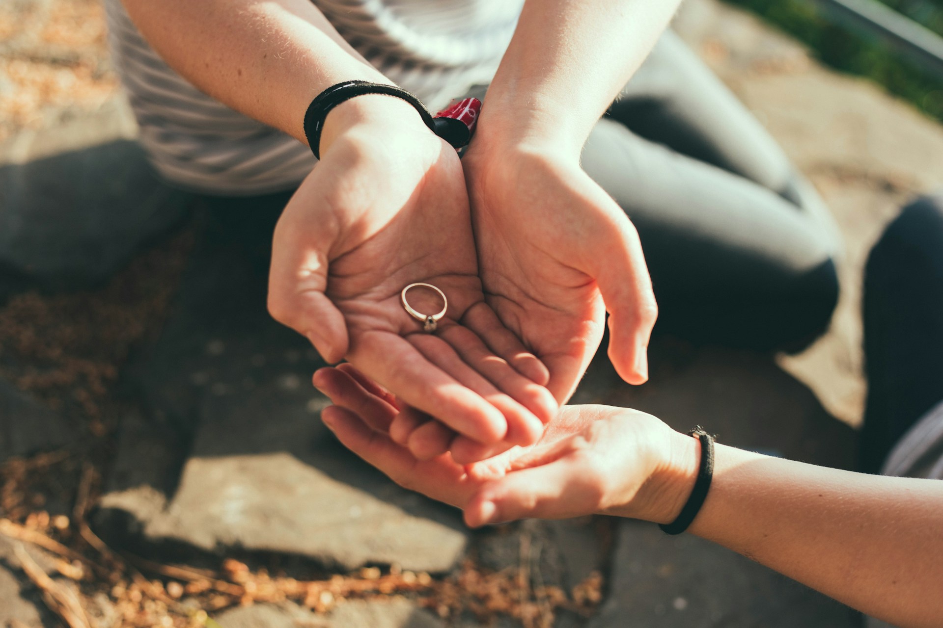 engagement ring in a hand