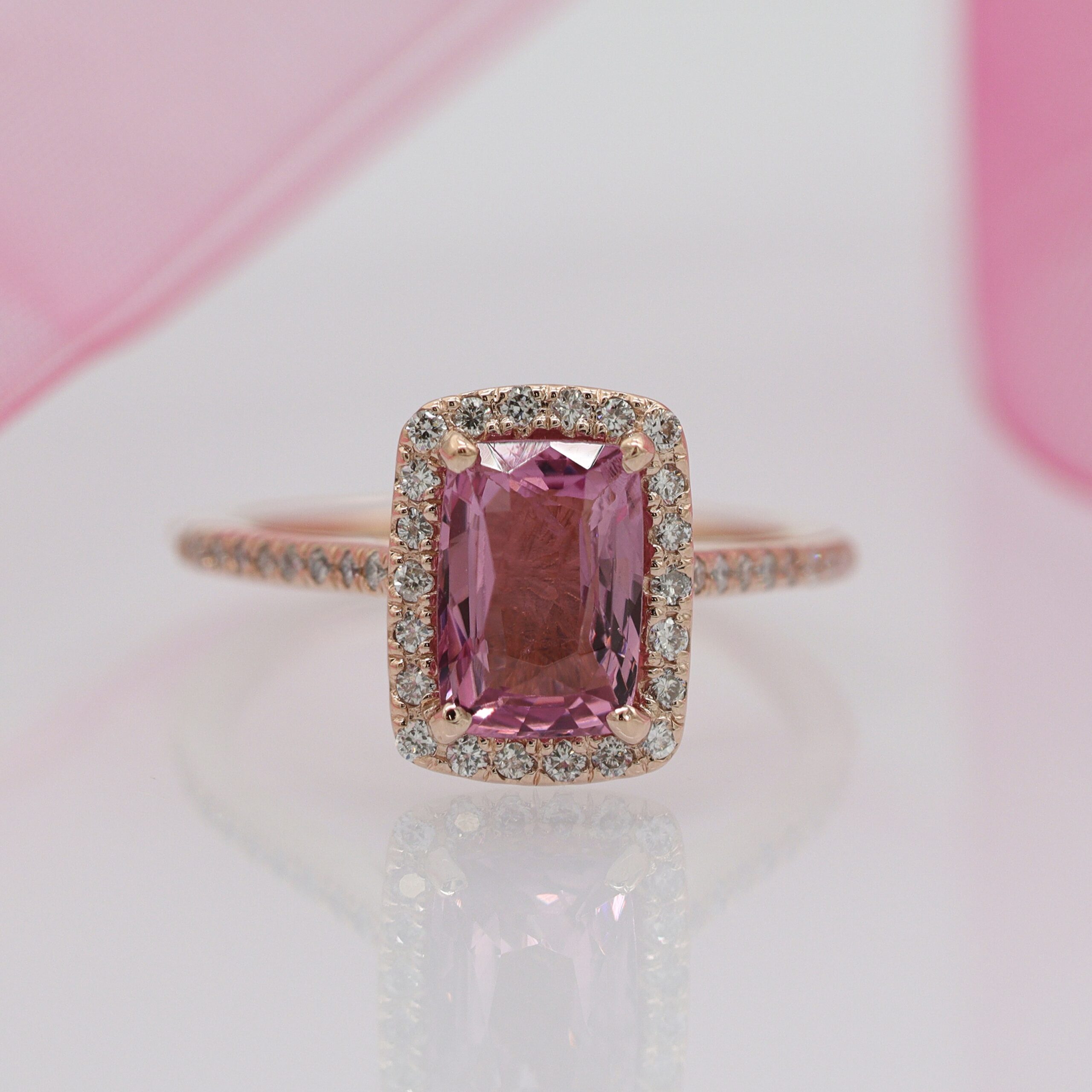 A pink diamond ring on display