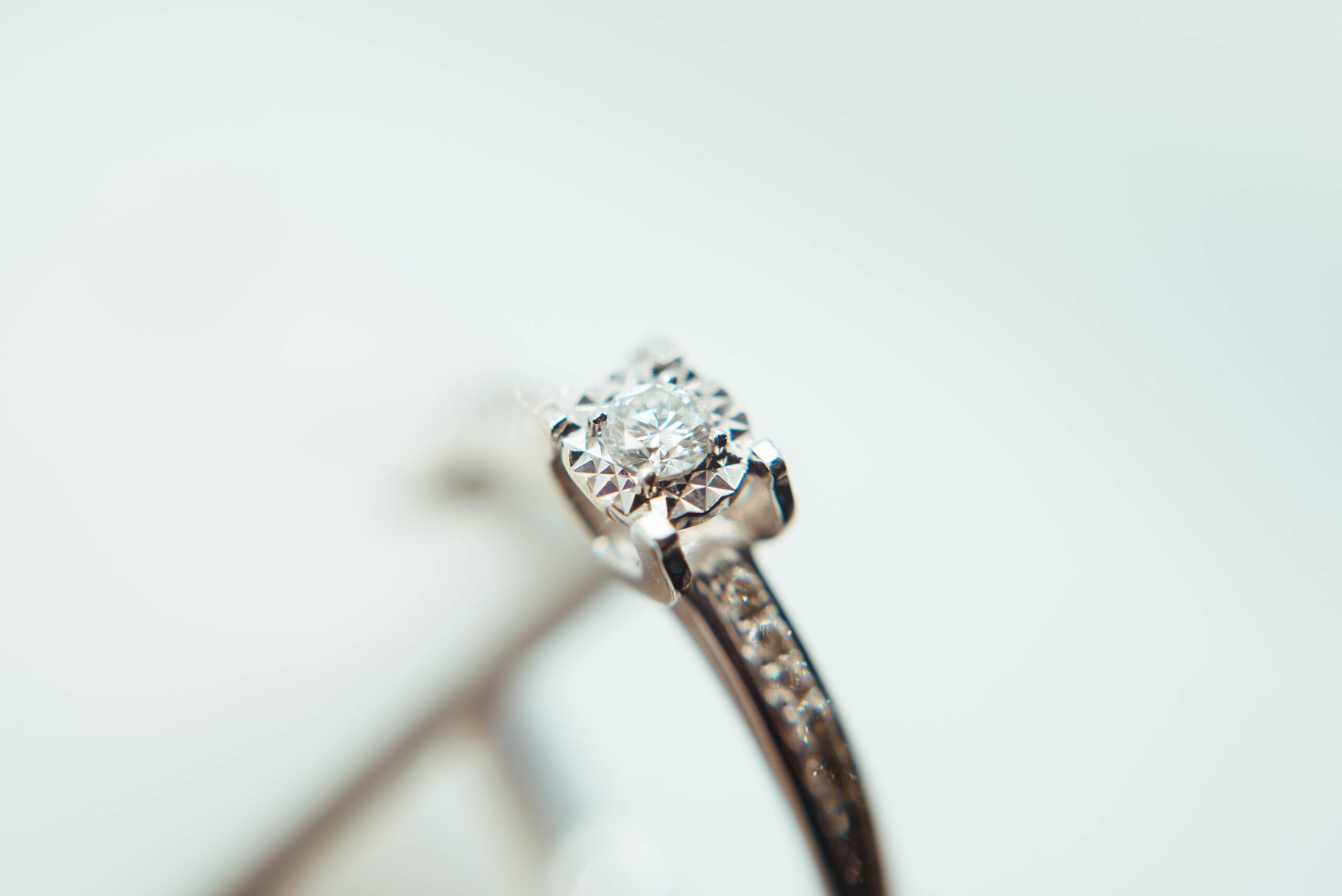 A close up of a ring with a prong setting