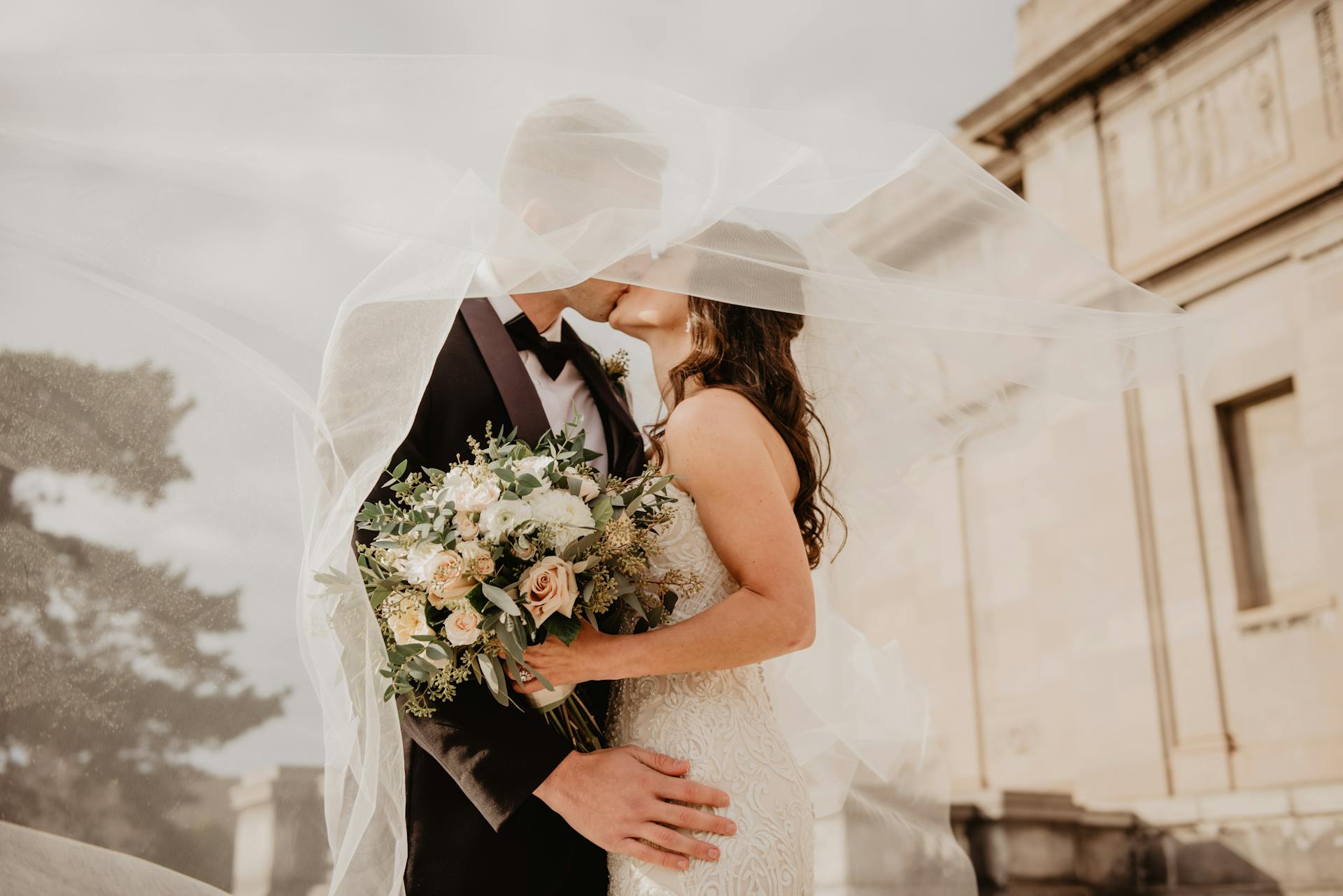 Couple kissing at their wedding